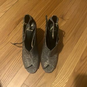 Great condition Brian Atwood Gold glitter heels.